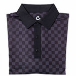 Folded black and gray checkered polo shirt with a brand logo on a white background